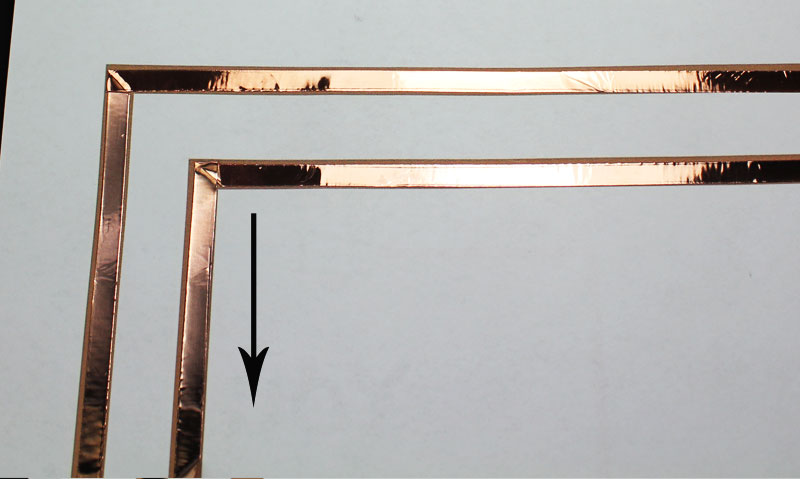 Lastly, you will need to fold the copper tape straight down. It helps if you use your fingernail to make a little indentation at the corner before folding down.